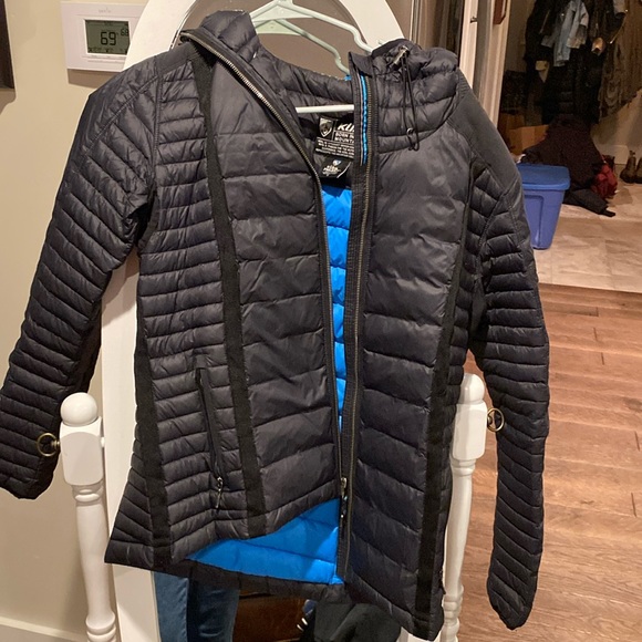 Kuhl black hooded puffer jacket. Women size S.